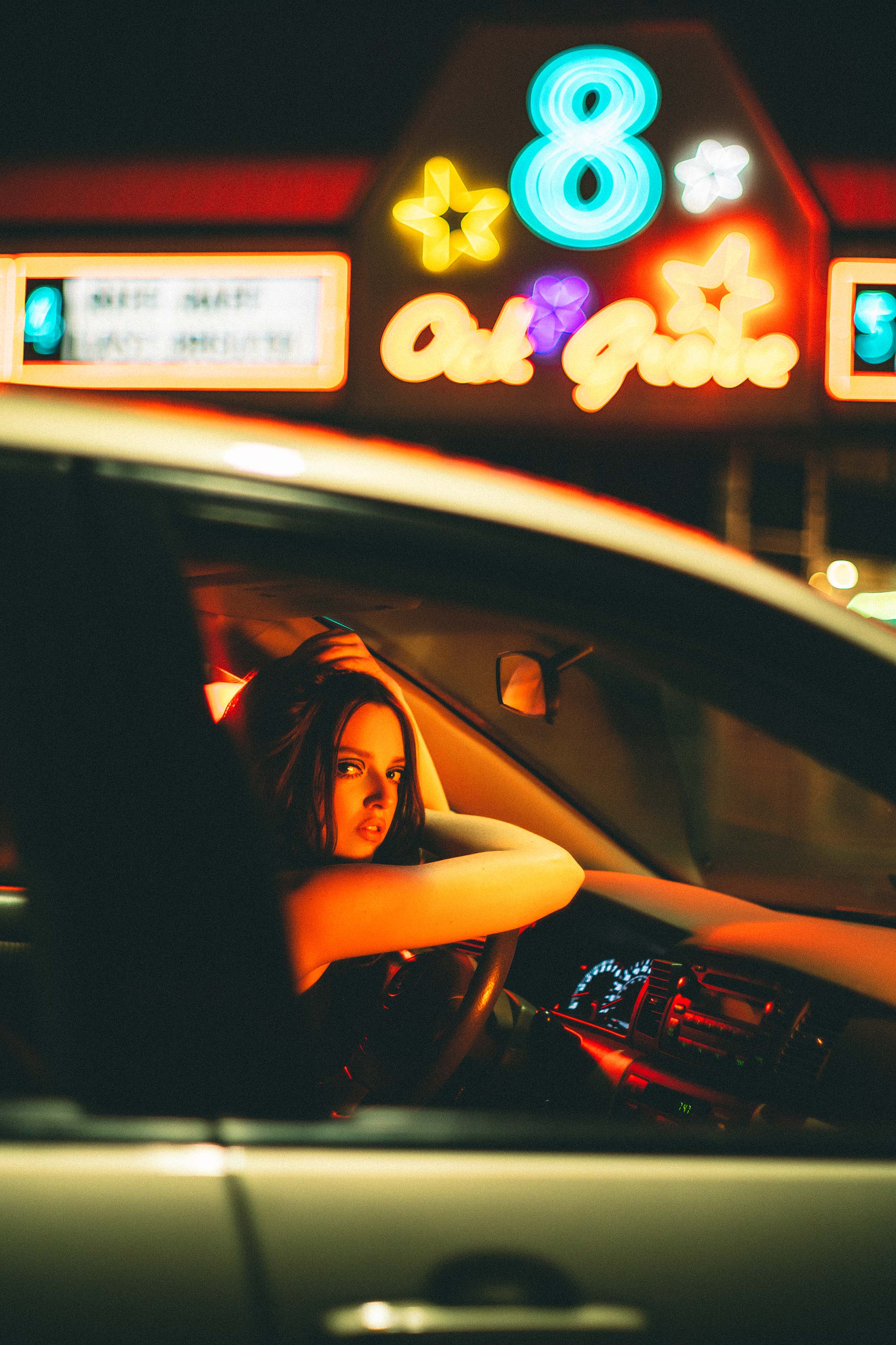 Cinematic Portraits with Vintage Flair by a Movie Theater — photograph 16 of 35